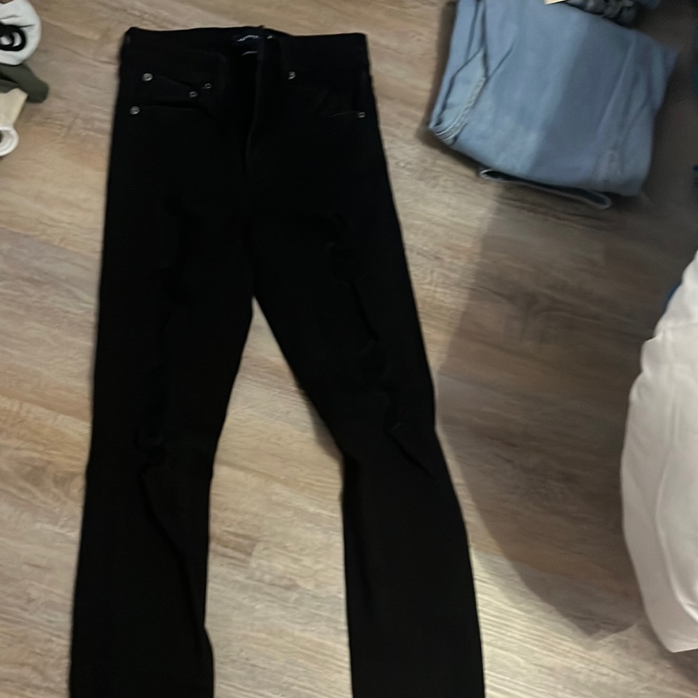 black ripped jeans